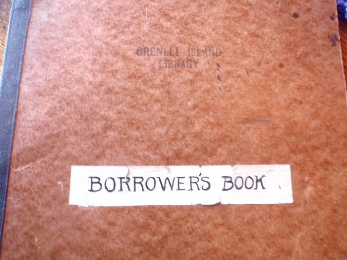 The original “Borrower’s Book” from the Grenell Island Library.