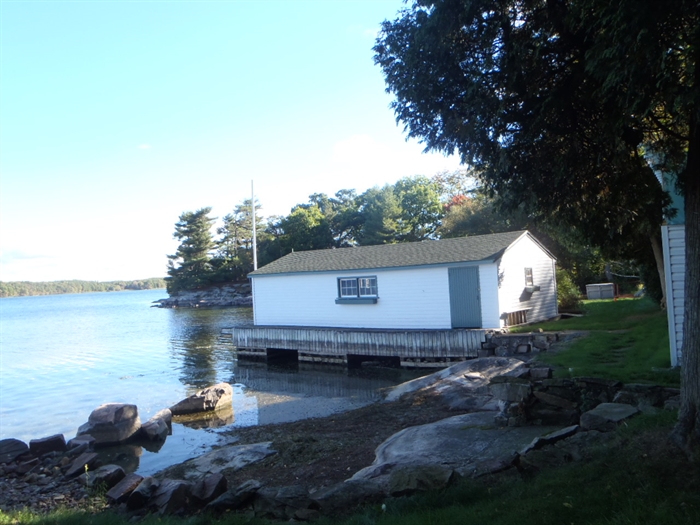 Low water allows us to see how a boathouse is supported. 