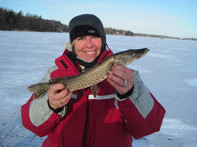 Ann Rodenbeck catches an Eel Bay Pike