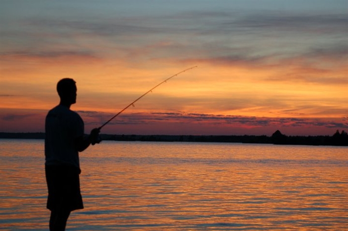 Fishing at sunset in Chippewa Bay. Photo by Jessica Croft.
