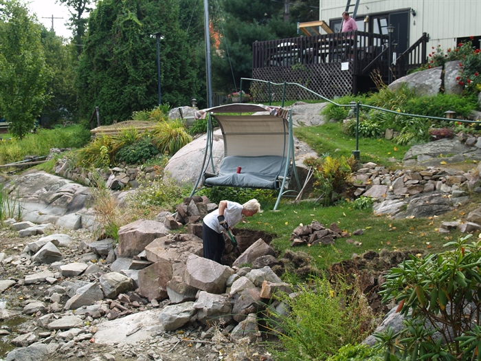 Neighbors take advantage of low water to build a seawall. Photo McElfresh family  