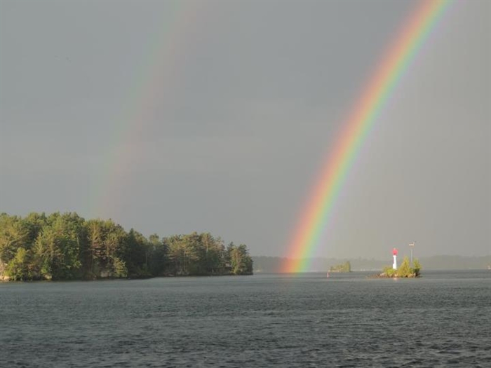 Double rainbow taken August 12, between rain showers, Ash Island. Photo by Dave Munn