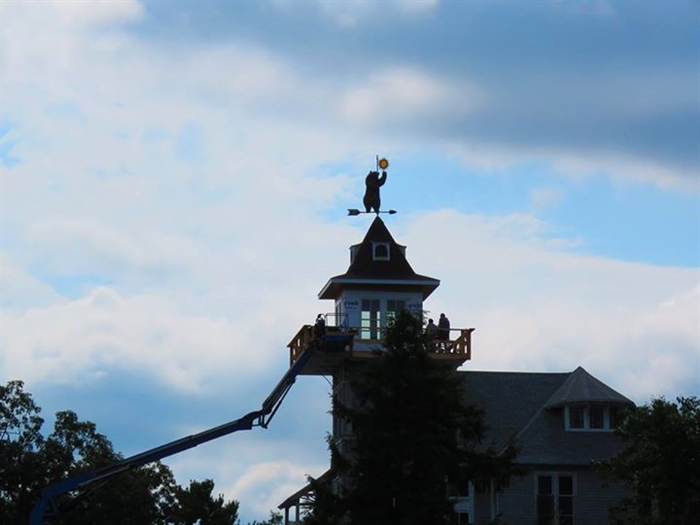 Dennis McCarthy catches  the installation of a new weather-vane on the cupola on Comfort Island.  (Nice work Will Salisbury!)