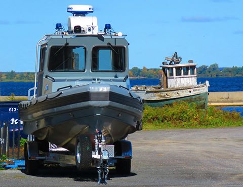 The old and the new, Metal Craft's newest patrol boat pictured near the 