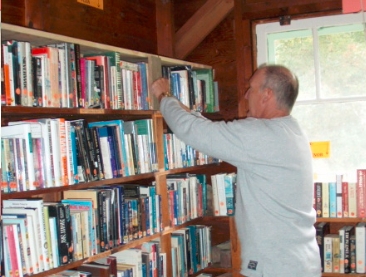 Gary McElfresh puts up a new shelf