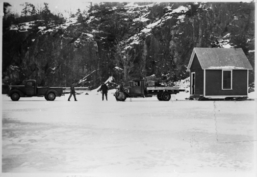 The Crew of Thomas Mitchell & Son, circa 1942, towing an old old kitchen from TI Park.