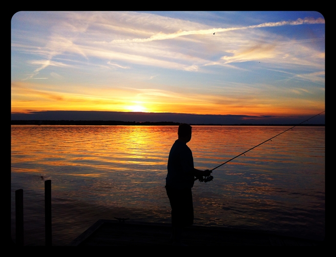 Fishing overlooking Carleton Island by Susan Crane