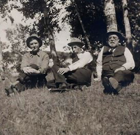 Resting after fishing, presumably “Doc” Munson & Manus Crosson took turns operating the camera.  