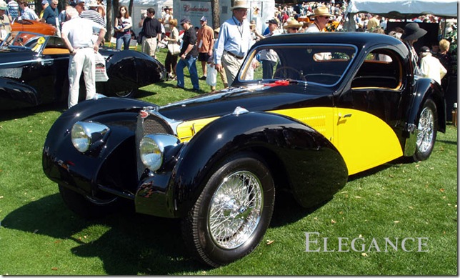 A Bugatti coupe proudly poses at Amelia Island      